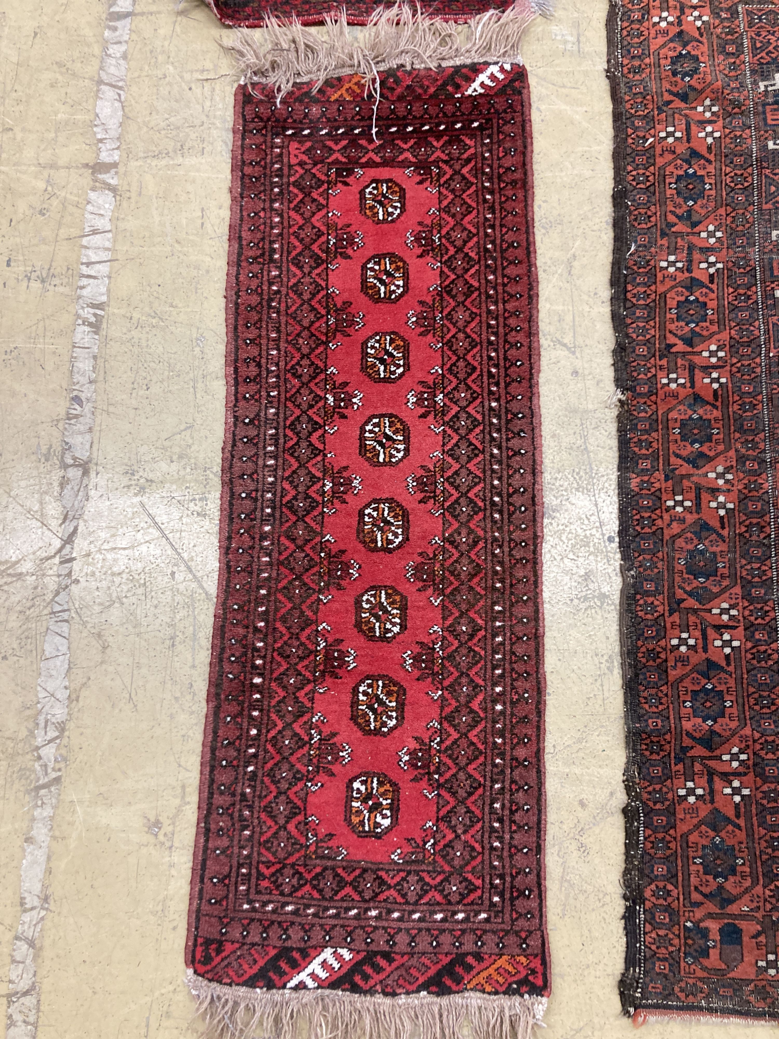 An antique Bokhara rug 170 x 94, Turkoman mat, a Belouch mat and two others.
